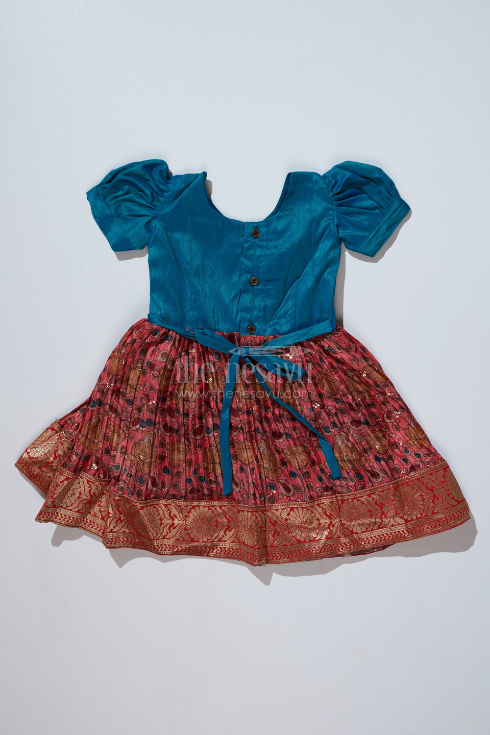 The Nesavu Silk Frock Girls Blue Ethnic Dress with Puff Sleeves and Chinon Silk Pleated Skirt for Festive Wear Nesavu Nesavu Girls Blue Ethnic Dress Puff Sleeves Chinon Silk Pleated Skirt