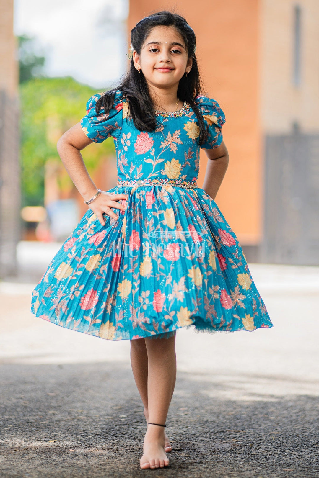 The Nesavu Silk Party Frock Girls Blue Floral Silk Party Frock with Puff Sleeves and Embellished Waistline Nesavu 18 (2Y) / Blue SF932B-18 Nesavu Teal Floral Silk Party Frock Puff Sleeves Pleated Skirt Girls