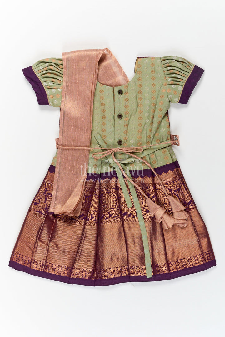 The Nesavu Girls Kanchi Silk Frock Girls Brown Silk Dress in Semi Kanchivaram with Rich Thread Embroidery and Lace Embellished Dupatta Nesavu Girls Brown Silk Dress in Semi Kanchivaram with Embroidered Dupatta and Traditional Zari Patterns | The Nesavu