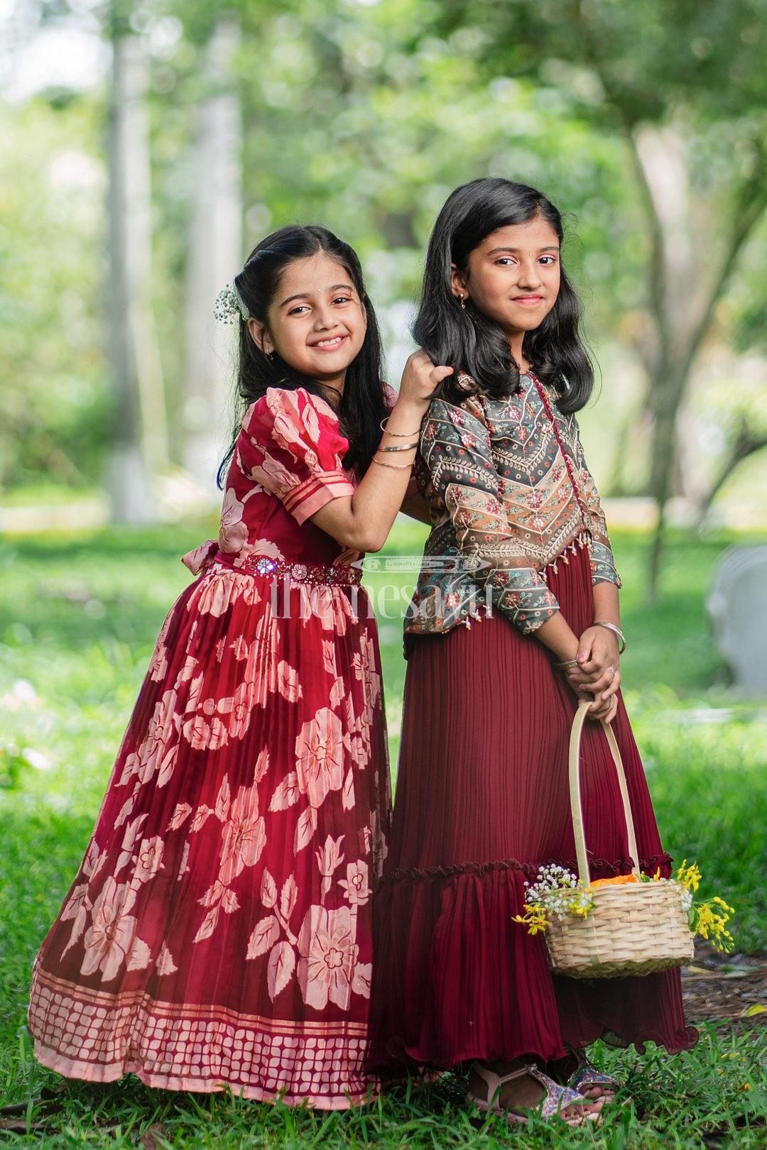 The Nesavu Girls Party Gown Girls Burgundy Party Gown with Floral Print and Puff Sleeves Nesavu Nesavu Burgundy Girls Party Gown Floral Prints Puff Sleeves Pleated Skirt