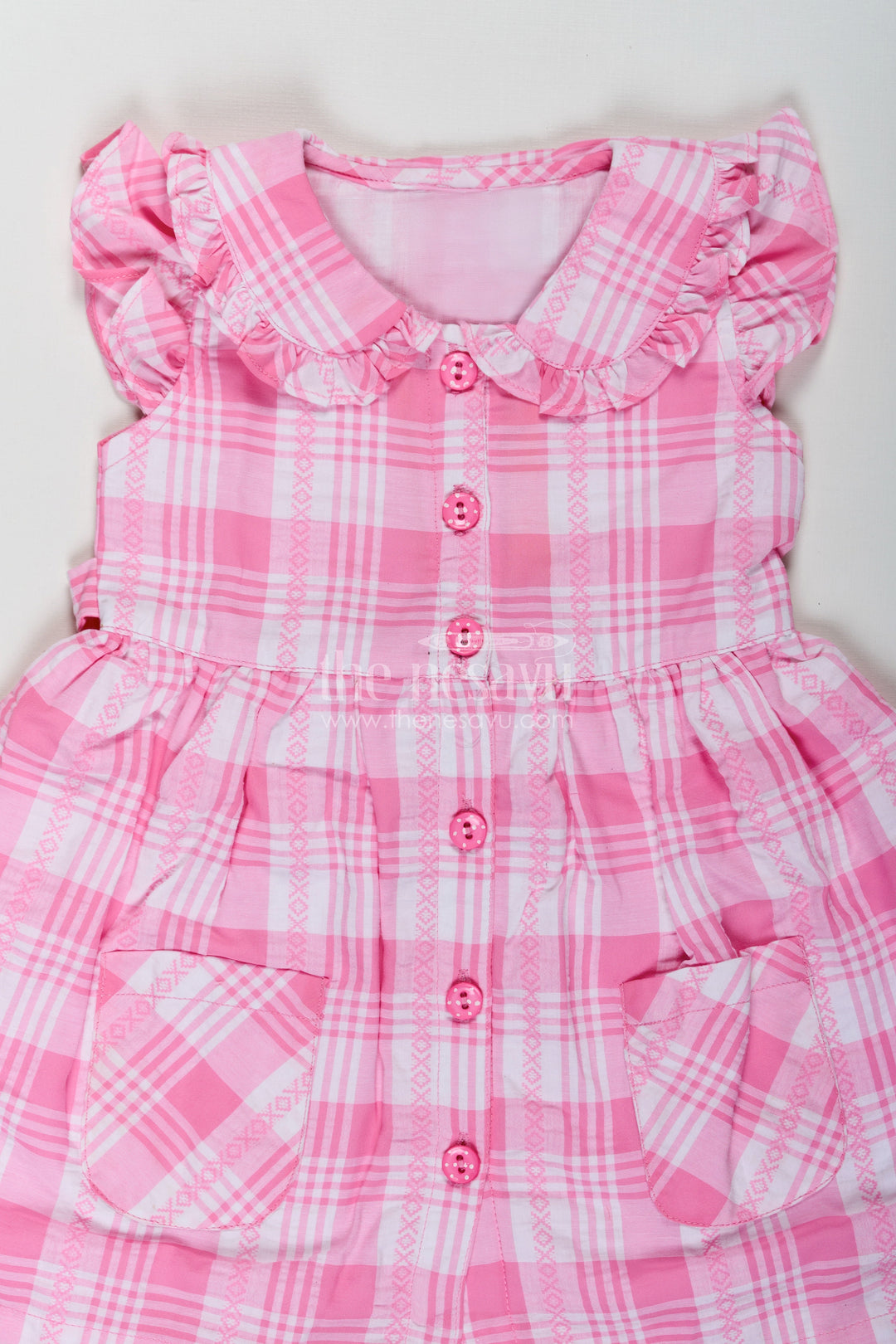 The Nesavu Girls Cotton Frock Girls Button Frock in Checked Cotton with Ruffled Neckline and Classic Pink Gingham Style Nesavu Nesavu Girls Checked Button Frock Pink Gingham Cotton Ruffles Front Closure