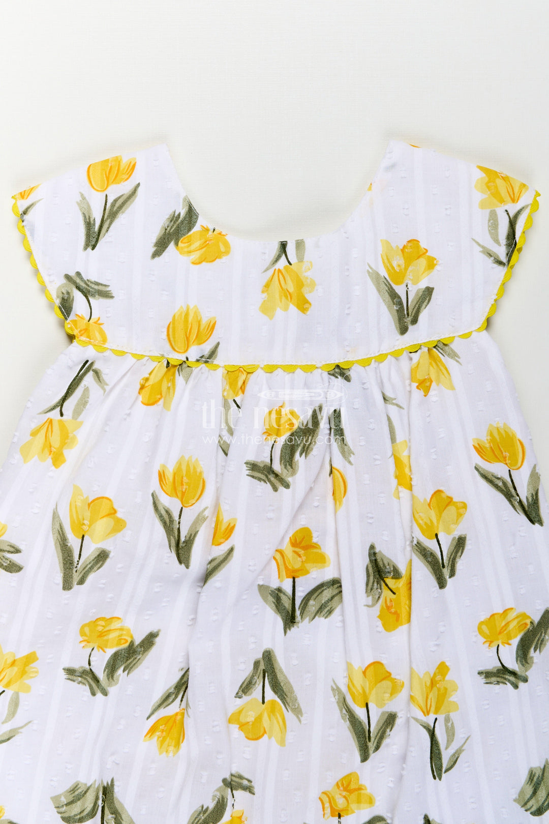 The Nesavu Girls Cotton Frock Girls Casual Cotton Frock for Infant with Yellow Floral Print and Ruffle Trim for Everyday Comfort Nesavu Girls Casual Cotton Frock Infant Yellow Floral Print Ruffled Hem Design | The Nesavu