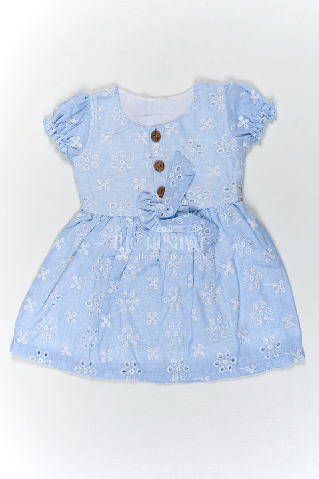 The Nesavu Girls Cotton Frock Girls Casual Wear Party Dress in Sky Blue Hakoba with Bow Belt and Wooden Button Detail Nesavu 18 (2Y) / Blue GFC1714C-18 Casual Wear Party Dress for Girls in Sky Blue Hakoba with Embroidery and Waist Bow | The Nesavu
