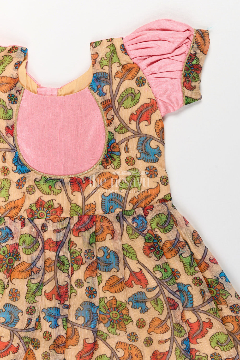 The Nesavu Silk Frock Girls Chanderi Cotton Fashion Dress with Pink Puff Sleeves and Colorful Floral Print for Everyday Charm Nesavu Nesavu Girls Chanderi Cotton Fashion Dress Pink Yoke Colorful Floral Print Everyday Wear