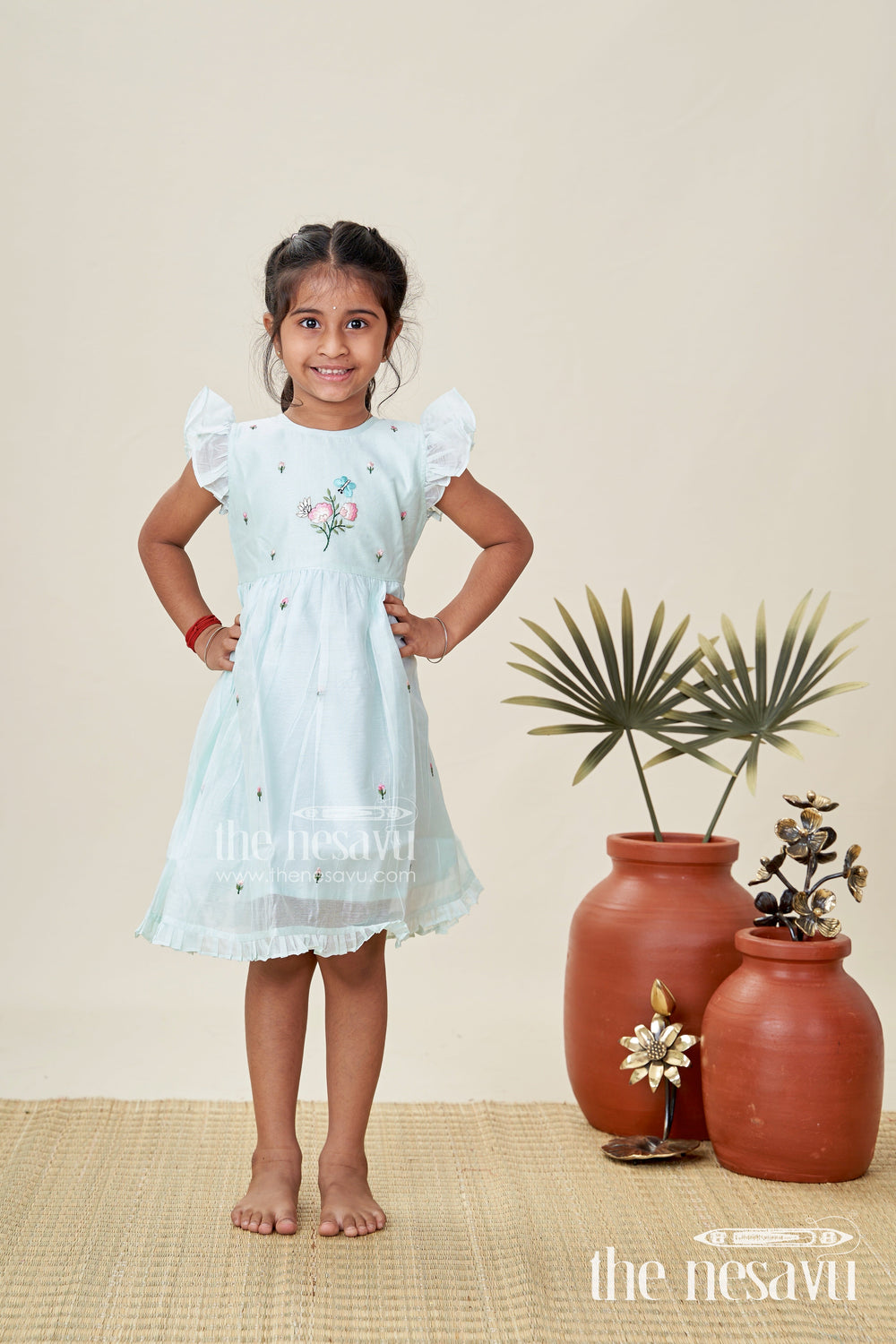 The Nesavu Girls Chanderi Frock Girls Chanderi Cotton Frock Ki Design in Mint Green with Floral and Butterfly Embroidery for Everyday Elegance Nesavu Nesavu Girls Chanderi Cotton Mint Green Frock Ki Design Floral Embroidery Soft Frills