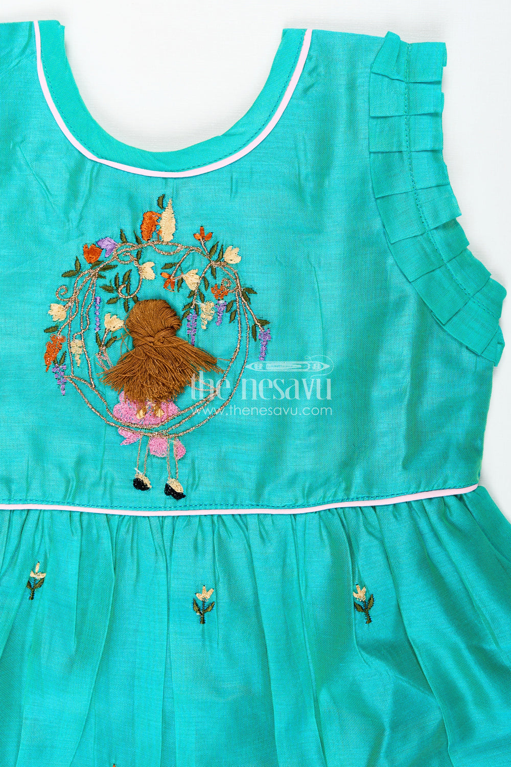 The Nesavu Girls Chanderi Frock Girls Chanderi Cotton Frock with Peacock Embroidery and Ruffled Sleeves for Elegant Occasions Nesavu Girls Chanderi Cotton Frock Peacock Embroidery Ruffled Sleeves Festive Wear | The Nesavu