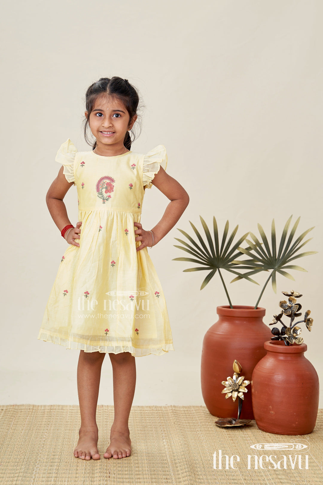 The Nesavu Girls Chanderi Frock Girls Chanderi Frock in Vibrant Colors with Thread Embroidery for Festive Moments Nesavu Nesavu Yellow Chanderi Cotton Girls Frock Floral Embroidery Ruffled Sleeves Traditional Wear