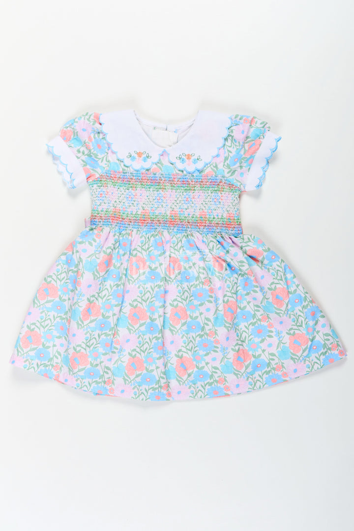 The Nesavu Girls Cotton Frock Girls Collar Frock Design in Floral Cotton with Smocked Bodice and Embroidered Collar for a Playful Yet Polished Look Nesavu 18 (2Y) / Blue GFC1681B-18 Girls Floral Cotton Collar Frock Design Smocking Embroidered Peter Pan Collar | The Nesavu