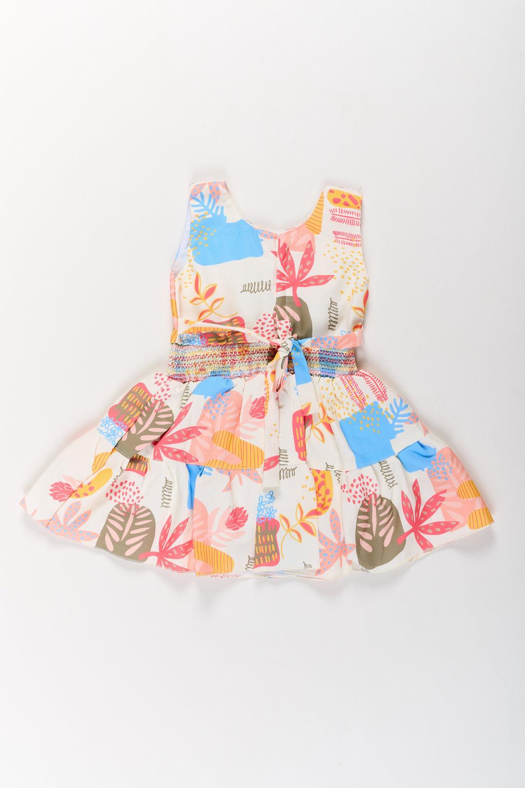 The Nesavu Girls Cotton Frock Girls Cotton a-Line Frock with Multicolor Prints and Smocked Waist Nesavu Girls Cotton A-Line Frock Multicolor Prints Tiered Skirt | The Nesavu