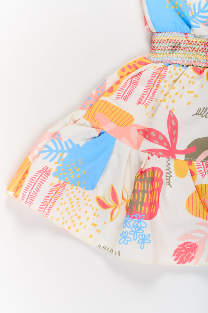 The Nesavu Girls Cotton Frock Girls Cotton a-Line Frock with Multicolor Prints and Smocked Waist Nesavu Girls Cotton A-Line Frock Multicolor Prints Tiered Skirt | The Nesavu