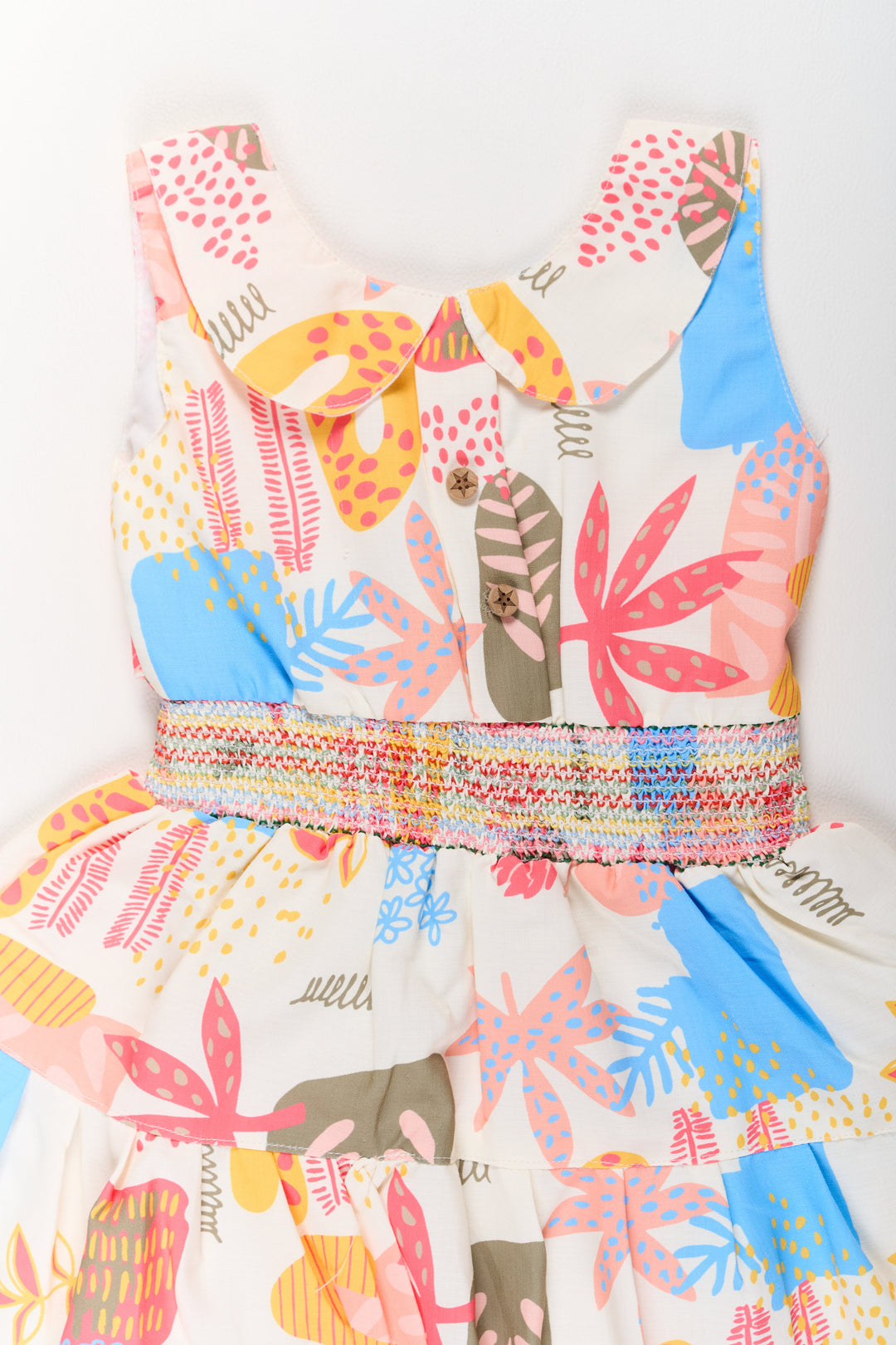 The Nesavu Girls Cotton Frock Girls Cotton a-Line Frock with Multicolor Prints and Smocked Waist Nesavu Girls Cotton A-Line Frock Multicolor Prints Tiered Skirt | The Nesavu