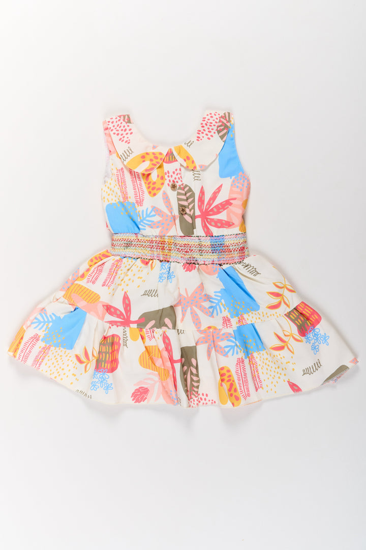 The Nesavu Girls Cotton Frock Girls Cotton a-Line Frock with Multicolor Prints and Smocked Waist Nesavu Girls Cotton A-Line Frock Multicolor Prints Tiered Skirt | The Nesavu