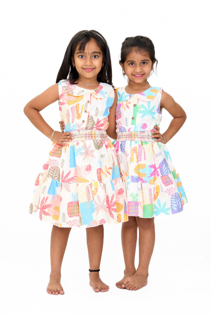 The Nesavu Girls Cotton Frock Girls Cotton a-Line Frock with Multicolor Prints and Smocked Waist Nesavu Girls Cotton A-Line Frock Multicolor Prints Tiered Skirt | The Nesavu