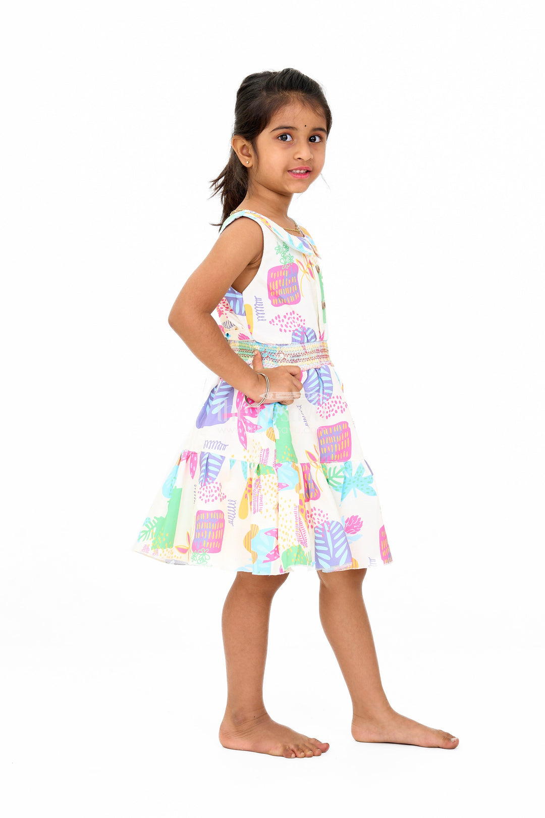 The Nesavu Girls Cotton Frock Girls Cotton a-Line Frock with Multicolor Prints and Smocked Waist Nesavu Girls Cotton A-Line Frock Multicolor Prints Tiered Skirt | The Nesavu