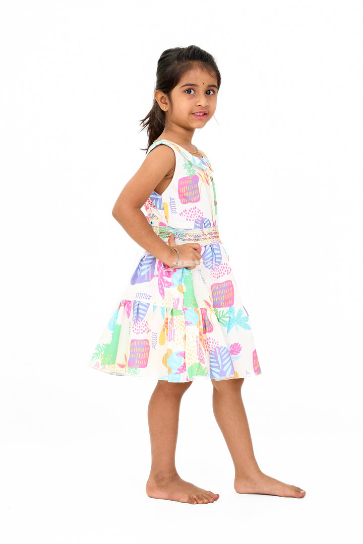 The Nesavu Girls Cotton Frock Girls Cotton a-Line Frock with Multicolor Prints and Smocked Waist Nesavu Girls Cotton A-Line Frock Multicolor Prints Tiered Skirt | The Nesavu