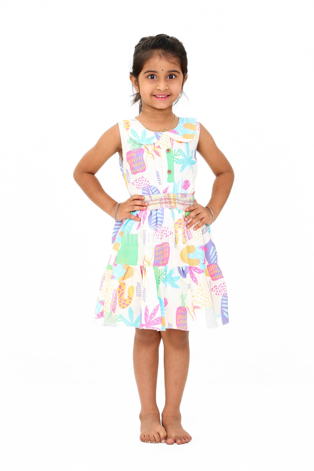 The Nesavu Girls Cotton Frock Girls Cotton a-Line Frock with Multicolor Prints and Smocked Waist Nesavu Girls Cotton A-Line Frock Multicolor Prints Tiered Skirt | The Nesavu
