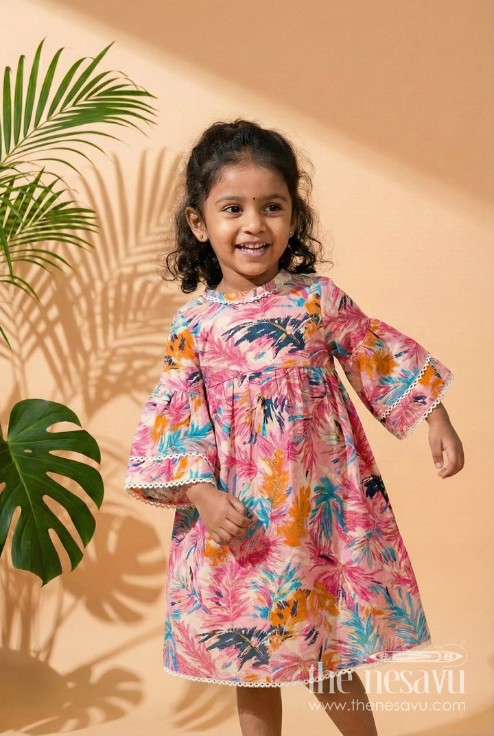 The Nesavu Girls Cotton Frock Girls Cotton Frock Girl with Flared Bell Sleeves and Vibrant Leaf Print in Multicolor Design Nesavu 16 (1Y) / Pink GFC1743A-16 Nesavu Cotton Frock Girl Flared Sleeves Multicolor Leaf Print Casual Everyday Style