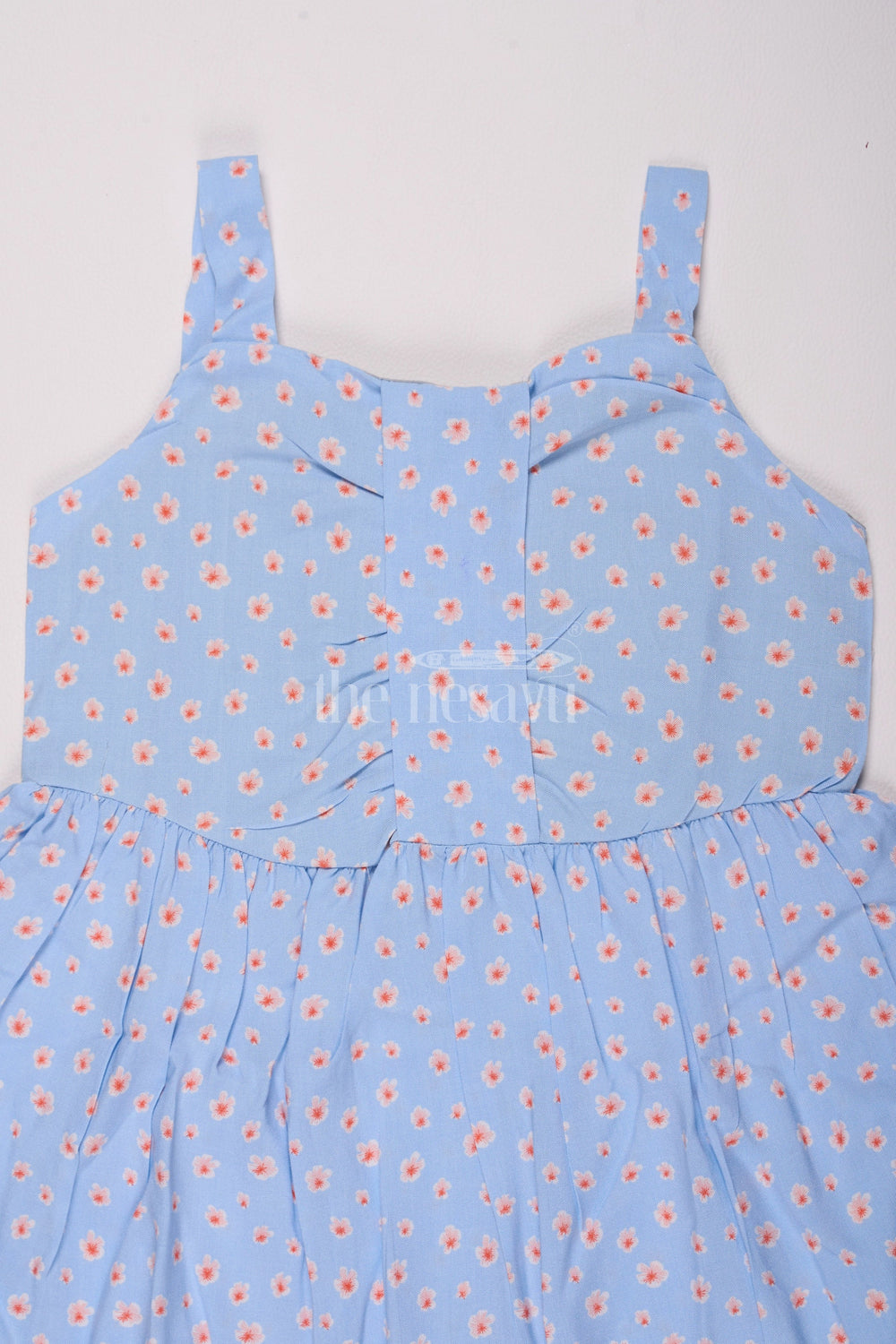 The Nesavu Girls Cotton Frock Girls Cotton Frock Online with Dainty Floral Prints in Light Blue Muslin Fabric Nesavu Nesavu Girls Cotton Frock Online Light Blue Muslin Floral Print