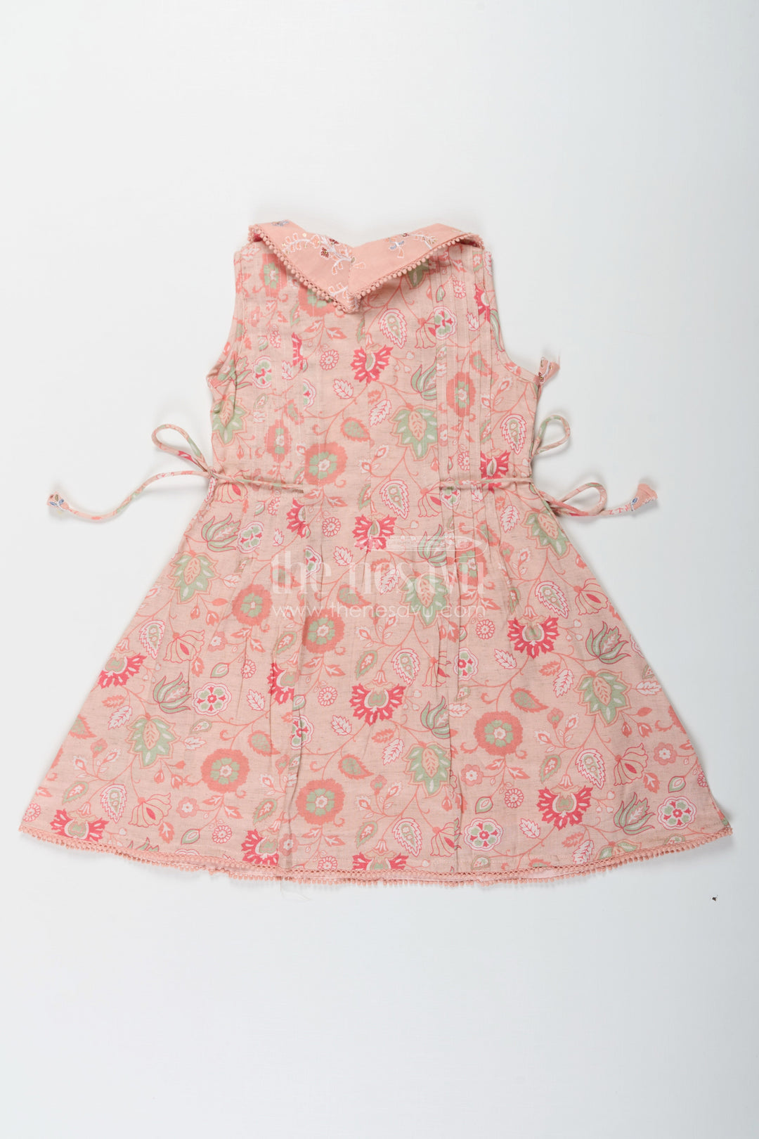 The Nesavu Girls Cotton Frock Girls Cotton Frock Simple Style with Peach Digital Prints and Thread Embroidered Front Nesavu Girls Cotton Frock Simple Peach Floral Design with Thread and Sequin Embroidery | The Nesavu