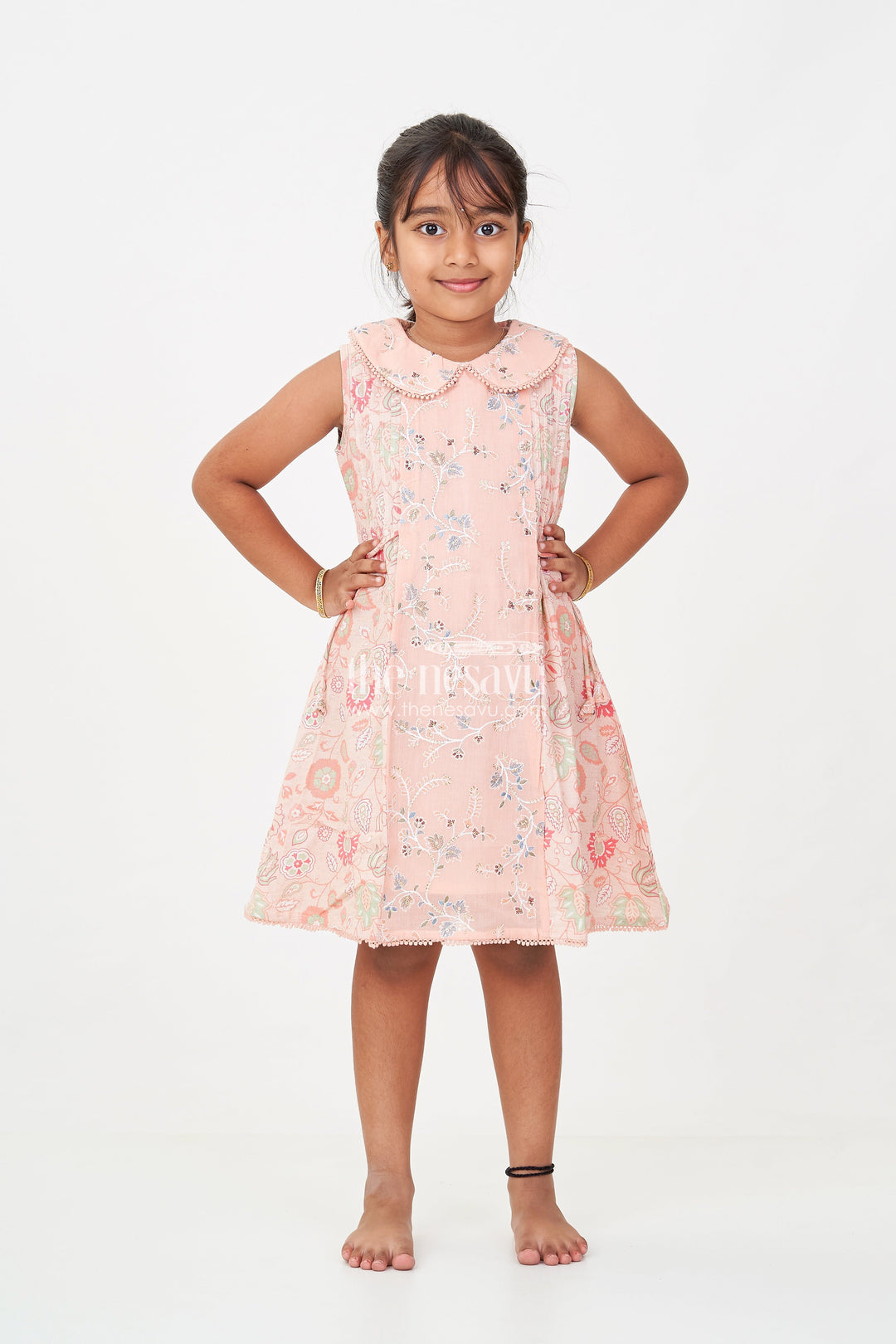 The Nesavu Girls Cotton Frock Girls Cotton Frock Simple Style with Peach Digital Prints and Thread Embroidered Front Nesavu Girls Cotton Frock Simple Peach Floral Design with Thread and Sequin Embroidery | The Nesavu