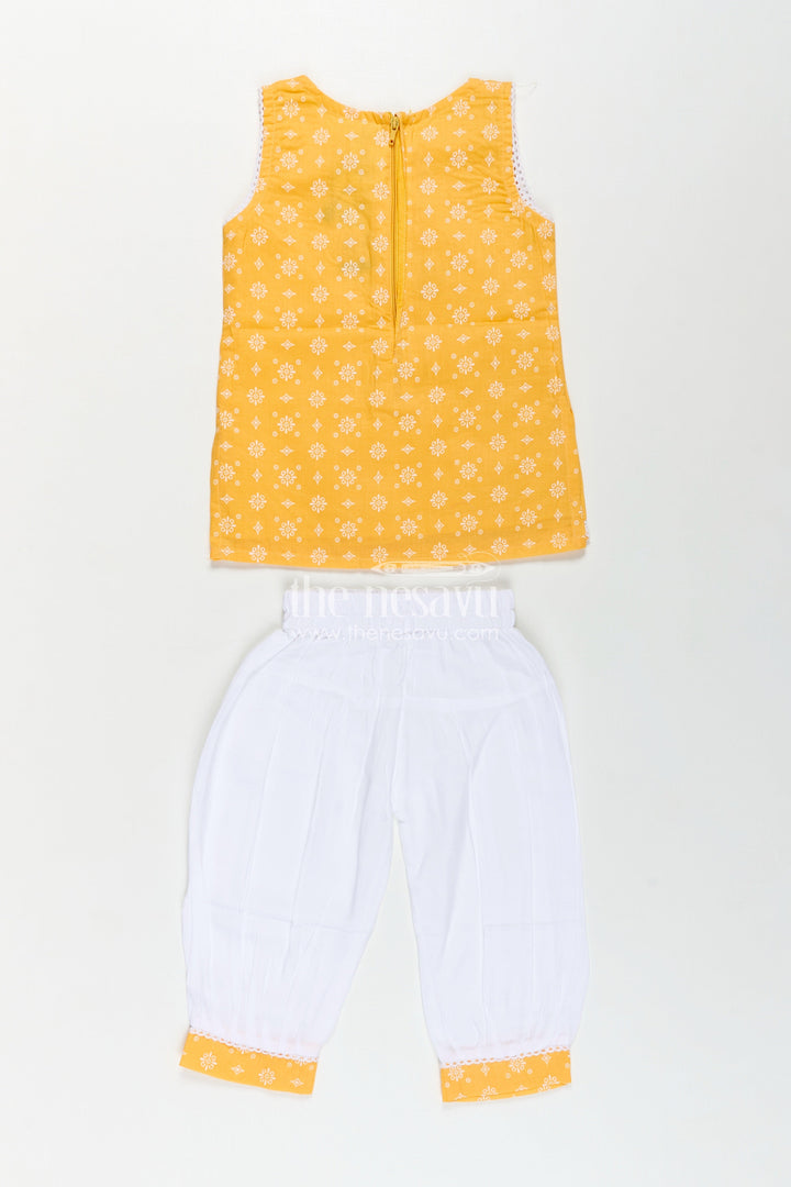 The Nesavu Girls Churidar Sets Girls Cotton Latest Chudi Set in Yellow with Stone Embellishment and Contrasting Dhoti Bottoms Nesavu Girls Yellow Cotton Chudi Set Embroidered Top White Dhoti Pants Ethnic Look | The Nesavu