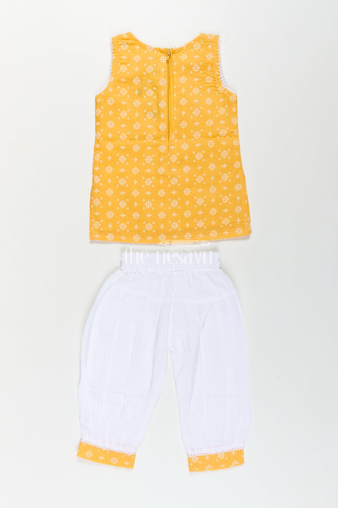 The Nesavu Girls Churidar Sets Girls Cotton Latest Chudi Set in Yellow with Stone Embellishment and Contrasting Dhoti Bottoms Nesavu Girls Yellow Cotton Chudi Set Embroidered Top White Dhoti Pants Ethnic Look | The Nesavu