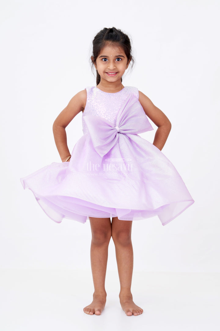 The Nesavu Girls Fancy Party Frock Girls Cotton Party Wear Frock in Lavender Organza with Giant Bow and Glittery Flared Silhouette Nesavu Girls Cotton Party Wear Frock Lavender Organza Glitter Finish Oversized Bow | The Nesavu