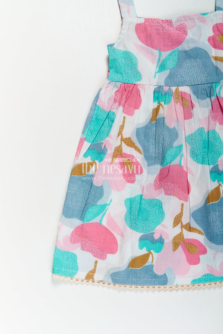 The Nesavu Girls Cotton Frock Girls Cotton Short Frock Party Wear in Sleeveless Style with Bold Floral Print On Pastel Base Nesavu Short Frock Party Wear Sleeveless Cotton Bold Floral Print Pleated Design | The Nesavu