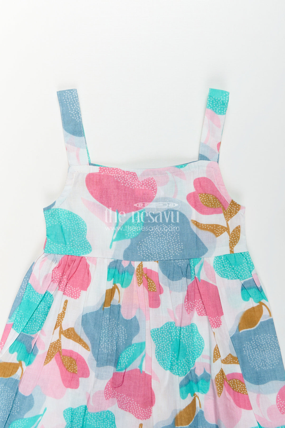 The Nesavu Girls Cotton Frock Girls Cotton Short Frock Party Wear in Sleeveless Style with Bold Floral Print On Pastel Base Nesavu Short Frock Party Wear Sleeveless Cotton Bold Floral Print Pleated Design | The Nesavu