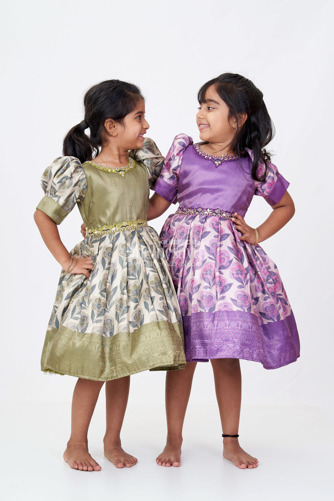 The Nesavu Silk Frock Girls Cotton Silk Frock in Rich Purple Jacquard with Floral Border and Embellished Neckline Nesavu Girls Cotton Silk Frock Purple Jacquard Floral Print Border Embellished Neckline | The Nesavu