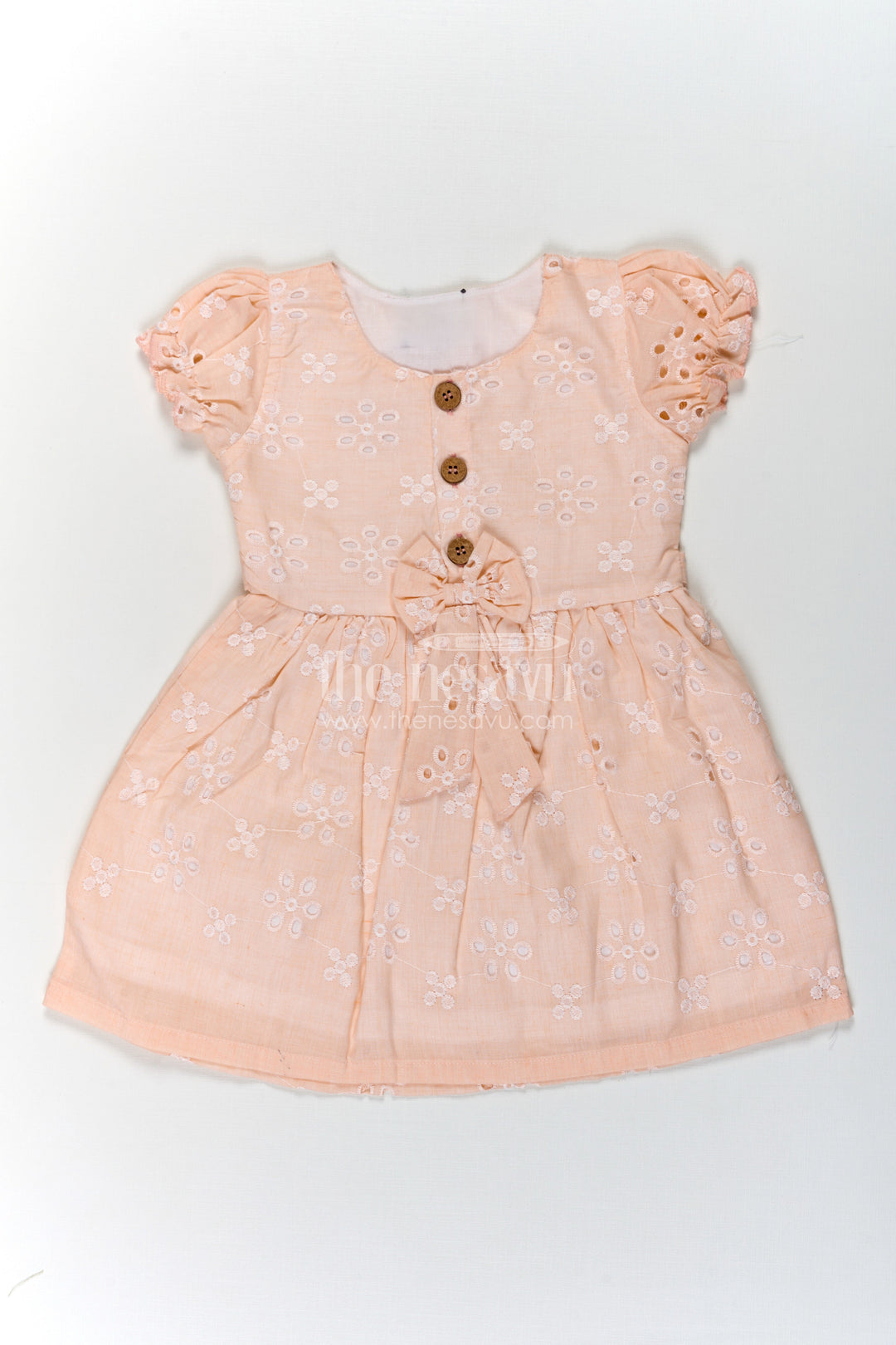 The Nesavu Girls Cotton Frock Girls Cotton Sleeveless Dress in Pastel Peach with All-Over Hakoba Floral Embroidery Nesavu 18 (2Y) / Orange GFC1714A-18 Cotton Sleeveless Dress for Girls in Peach Hakoba Fabric with Embroidery and Button Detail | The Nesavu
