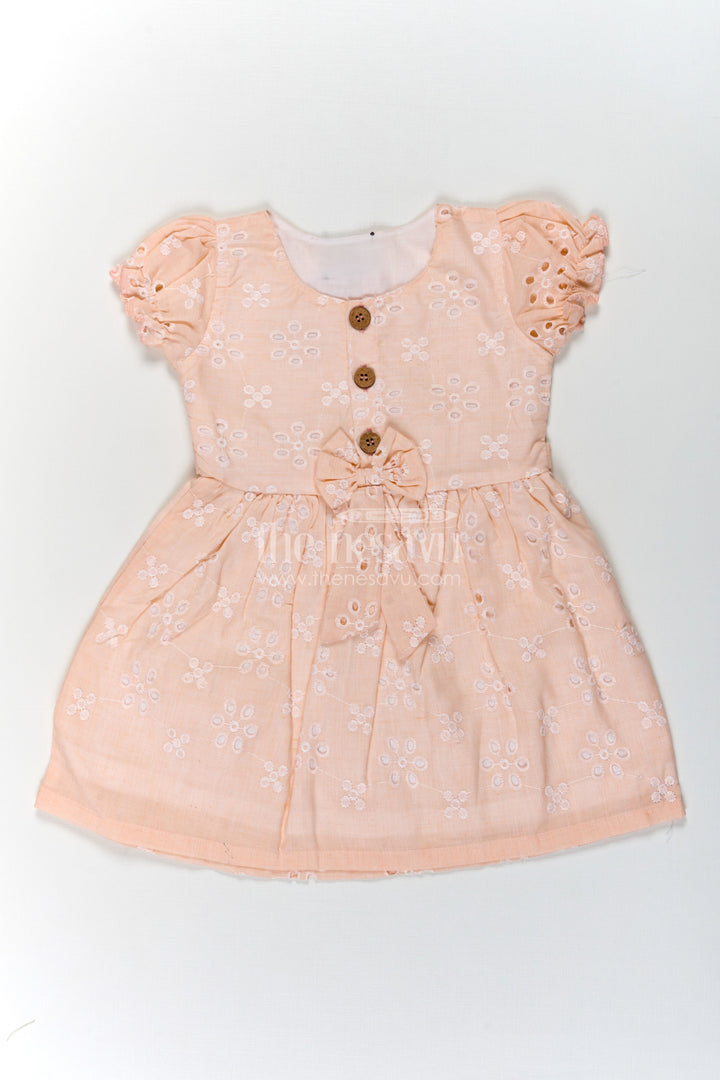 The Nesavu Girls Cotton Frock Girls Cotton Sleeveless Dress in Pastel Peach with All-Over Hakoba Floral Embroidery Nesavu 18 (2Y) / Orange GFC1714A-18 Cotton Sleeveless Dress for Girls in Peach Hakoba Fabric with Embroidery and Button Detail | The Nesavu