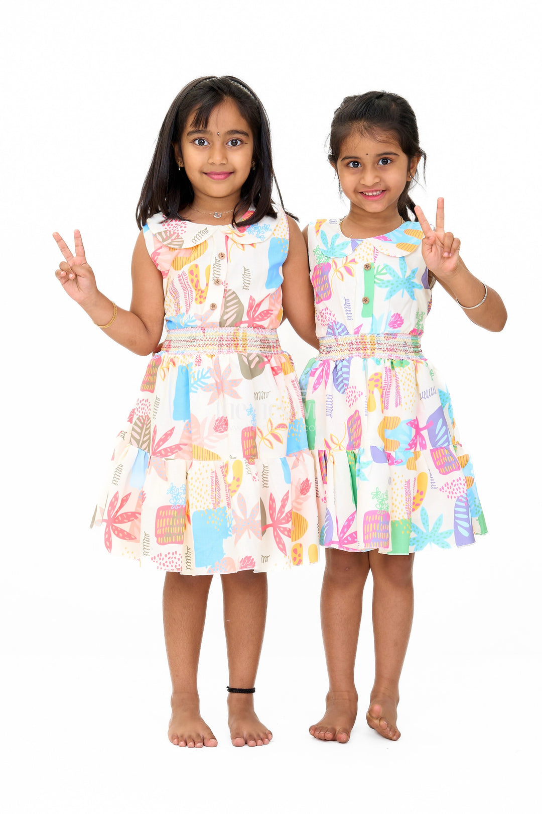 The Nesavu Girls Cotton Frock Girls Cotton Sleeveless Frock with Vibrant Prints and Peter Pan Collar Nesavu Girls Cotton Sleeveless Frock Smocked Bodice Vibrant Prints | The Nesavu