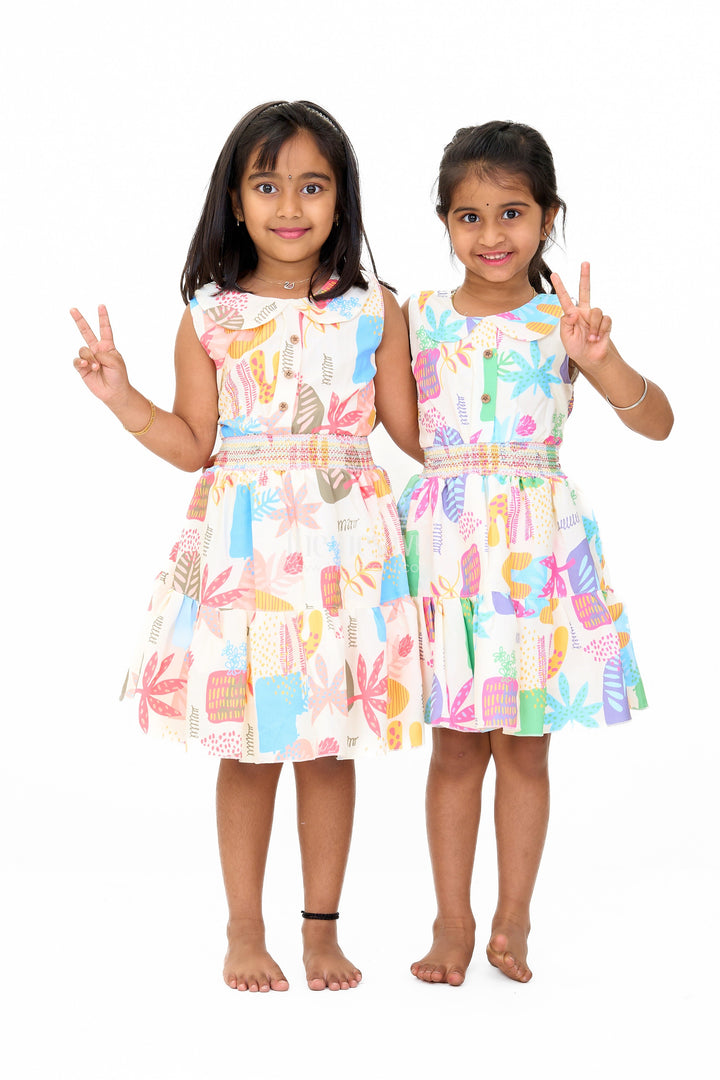 The Nesavu Girls Cotton Frock Girls Cotton Sleeveless Frock with Vibrant Prints and Peter Pan Collar Nesavu Girls Cotton Sleeveless Frock Smocked Bodice Vibrant Prints | The Nesavu