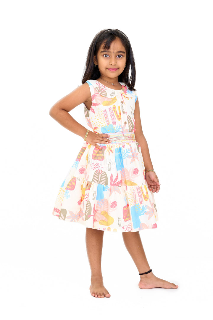 The Nesavu Girls Cotton Frock Girls Cotton Sleeveless Frock with Vibrant Prints and Peter Pan Collar Nesavu Girls Cotton Sleeveless Frock Smocked Bodice Vibrant Prints | The Nesavu