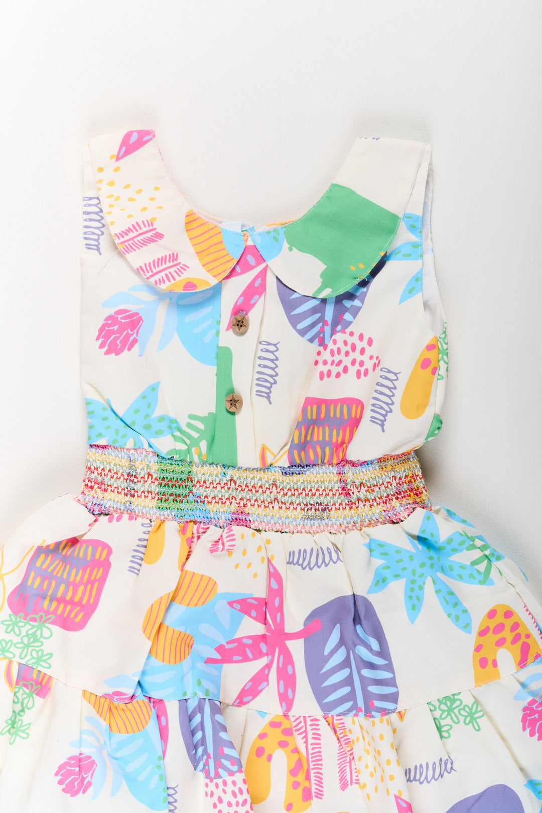 The Nesavu Girls Cotton Frock Girls Cotton Sleeveless Frock with Vibrant Prints and Peter Pan Collar Nesavu Nesavu Girls Cotton Sleeveless Frock Smocked Bodice Vibrant Prints