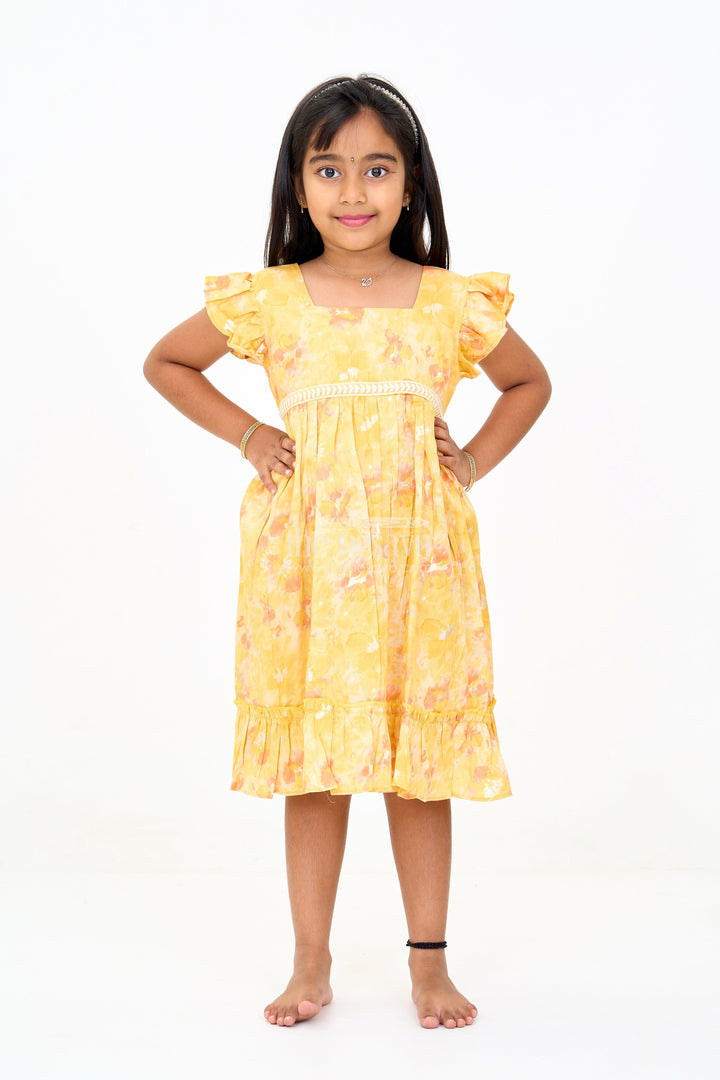 The Nesavu Girls Cotton Frock Girls Cotton Summer Dress for Babies with Yellow and Orange Floral Prints Nesavu 16 (1Y) / Yellow GFC1579B-16 Nesavu Girls Cotton Summer Dress Babies Floral Prints Ruffled Hem