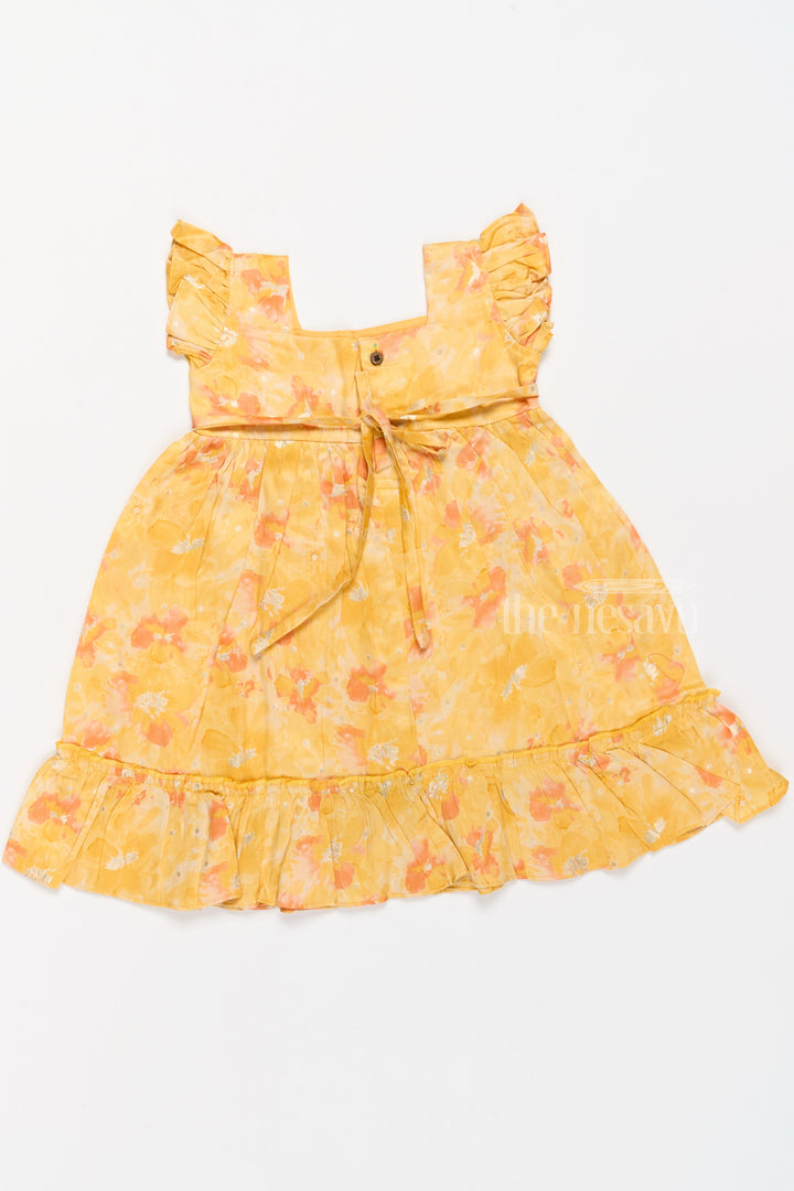 The Nesavu Girls Cotton Frock Girls Cotton Summer Dress for Babies with Yellow and Orange Floral Prints Nesavu Girls Cotton Summer Dress Babies Floral Prints Ruffled Hem | The Nesavu
