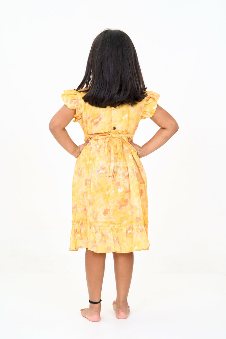The Nesavu Girls Cotton Frock Girls Cotton Summer Dress for Babies with Yellow and Orange Floral Prints Nesavu Girls Cotton Summer Dress Babies Floral Prints Ruffled Hem | The Nesavu