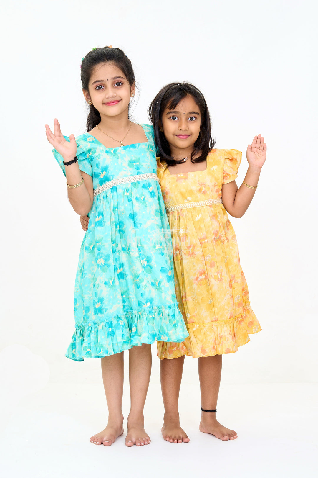 The Nesavu Girls Cotton Frock Girls Cotton Summer Dress for Babies with Yellow and Orange Floral Prints Nesavu Girls Cotton Summer Dress Babies Floral Prints Ruffled Hem | The Nesavu