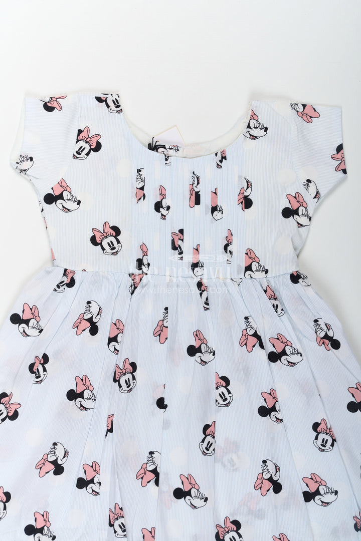 The Nesavu Girls Cotton Frock Girls Cotton White Frock for Eid with Minnie Mouse Digital Print and Ruffled Hem for a Festive Fun Look Nesavu Girls White Frock Eid Soft Cotton Minnie Mouse Digital Print Frill Hem Design | The Nesavu