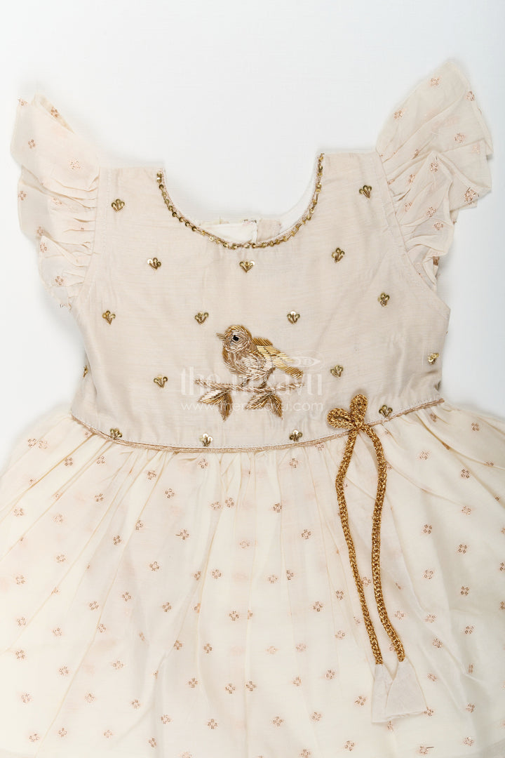The Nesavu Girls Chanderi Frock Girls Cream Chanderi Simple Frocks with Embroidered Bird Motif and Frilled Sleeves Nesavu Cream Chanderi Simple Frocks Girls Bird Embroidery Frilled Sleeves | The Nesavu