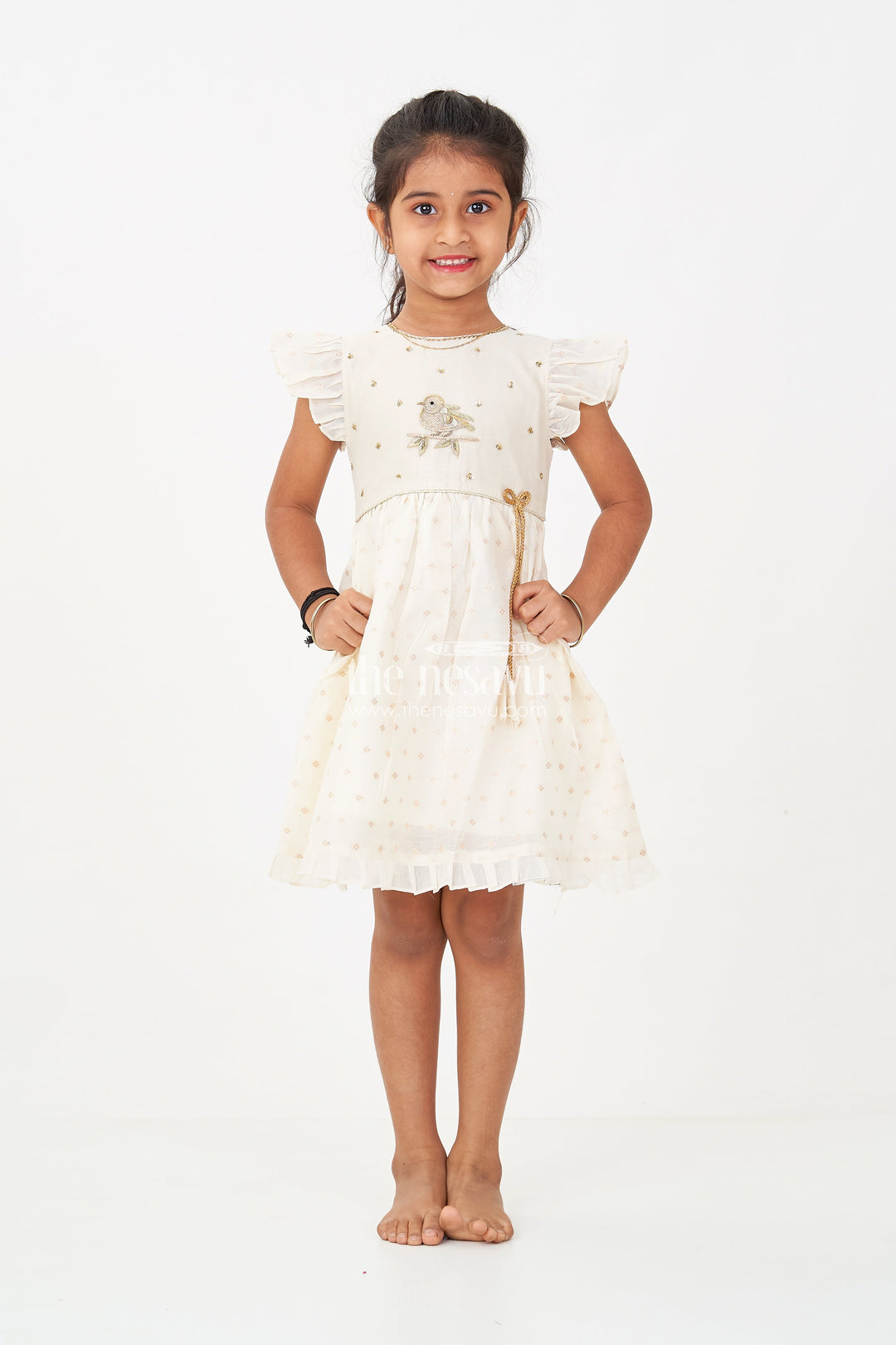 The Nesavu Girls Chanderi Frock Girls Cream Chanderi Simple Frocks with Embroidered Bird Motif and Frilled Sleeves Nesavu Cream Chanderi Simple Frocks Girls Bird Embroidery Frilled Sleeves | The Nesavu