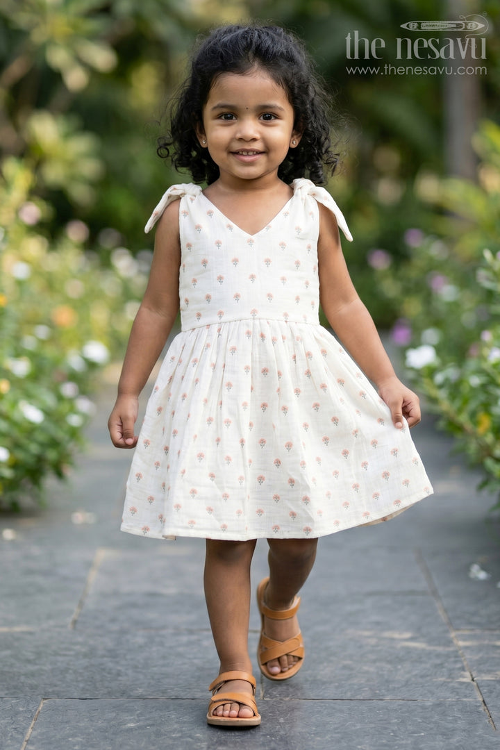 The Nesavu Girls Cotton Frock Girls Cream Muslin Cotton Frock with Allover Floral Print Perfect for Summer Collection for Toddlers and Kids Nesavu 16 (1Y) / Cream GFC1689A-16 Girls Cream Muslin Cotton Frock Floral Print Designed Summer Collection Perfect Casual Days | The Nesavu