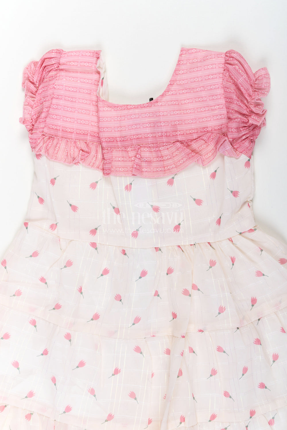 The Nesavu Girls Cotton Frock Girls Cream Pink Color Dress in Georgette with Ruffled Neckline and Allover Floral Print Nesavu Nesavu Girls Cream Pink Floral Print Dress Georgette Ruffled Yoke Tiered Design