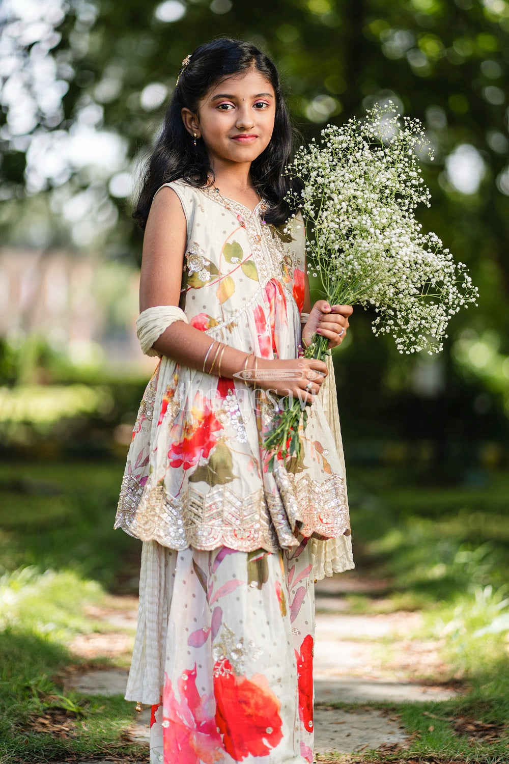 The Nesavu Girls Sharara / Plazo Set Girls Cream Sharara Set with Floral Kurta and Gold Bead Embellishments Nesavu Nesavu Cream Floral Sharara Set Girls Gold Beadwork Pleated Pants