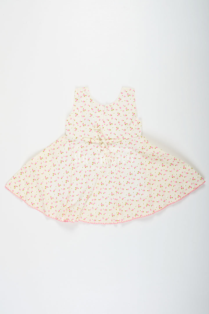 The Nesavu Baby Cotton Frocks Girls Cream Soft Cotton Dresses Online with Allover Floral Print and Lace Bow Waist Detail Nesavu Soft Cotton Dresses Online Girls Allover Floral Print Lace Waist Bow Detail | The Nesavu