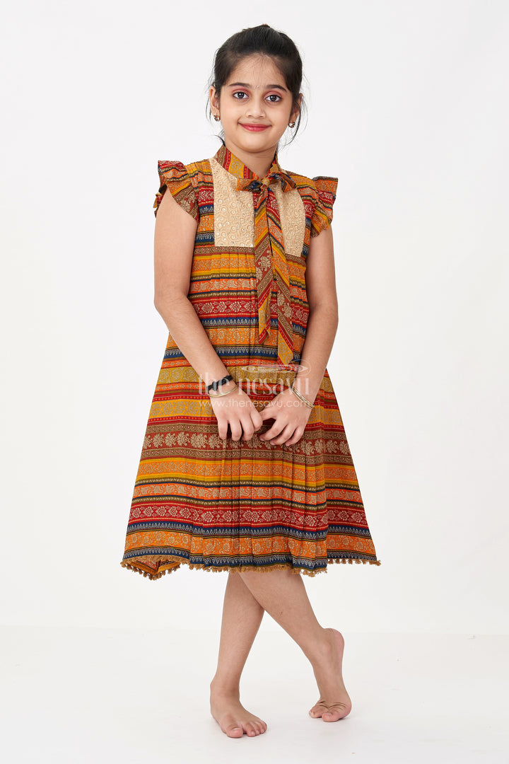 The Nesavu Girls Cotton Frock Girls Cute Cotton Frocks with Ethnic Printed Design and Ruffle Sleeves for a Stylish Look Nesavu 22 (4Y) / Orange GFC1628A-22 Nesavu Girls Cute Cotton Frocks Ethnic Print Ruffle Sleeves a Stylish Look