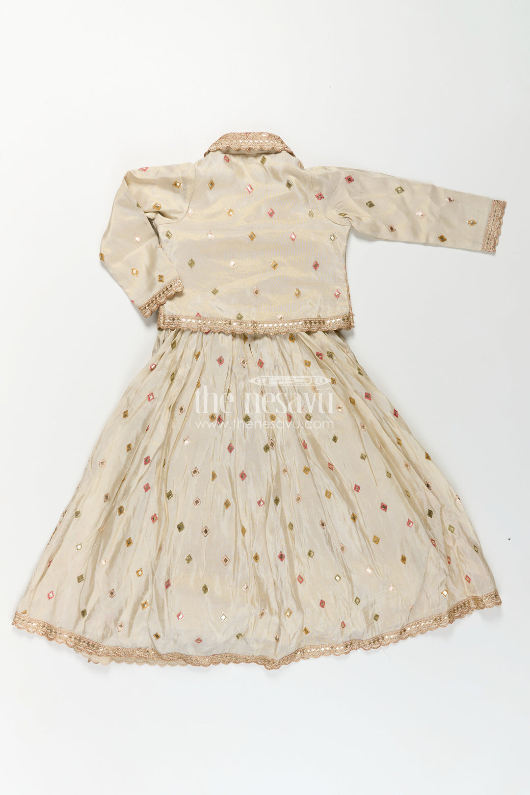 The Nesavu Girls Silk Gown Girls Designer Anarkali in Ivory Shimmer Silk with Embroidered Jacket and Pleated Skirt Finish Nesavu Ivory Designer Anarkali Gown Girls Shimmer Silk Embroidered Jacket Flared Skirt | The Nesavu