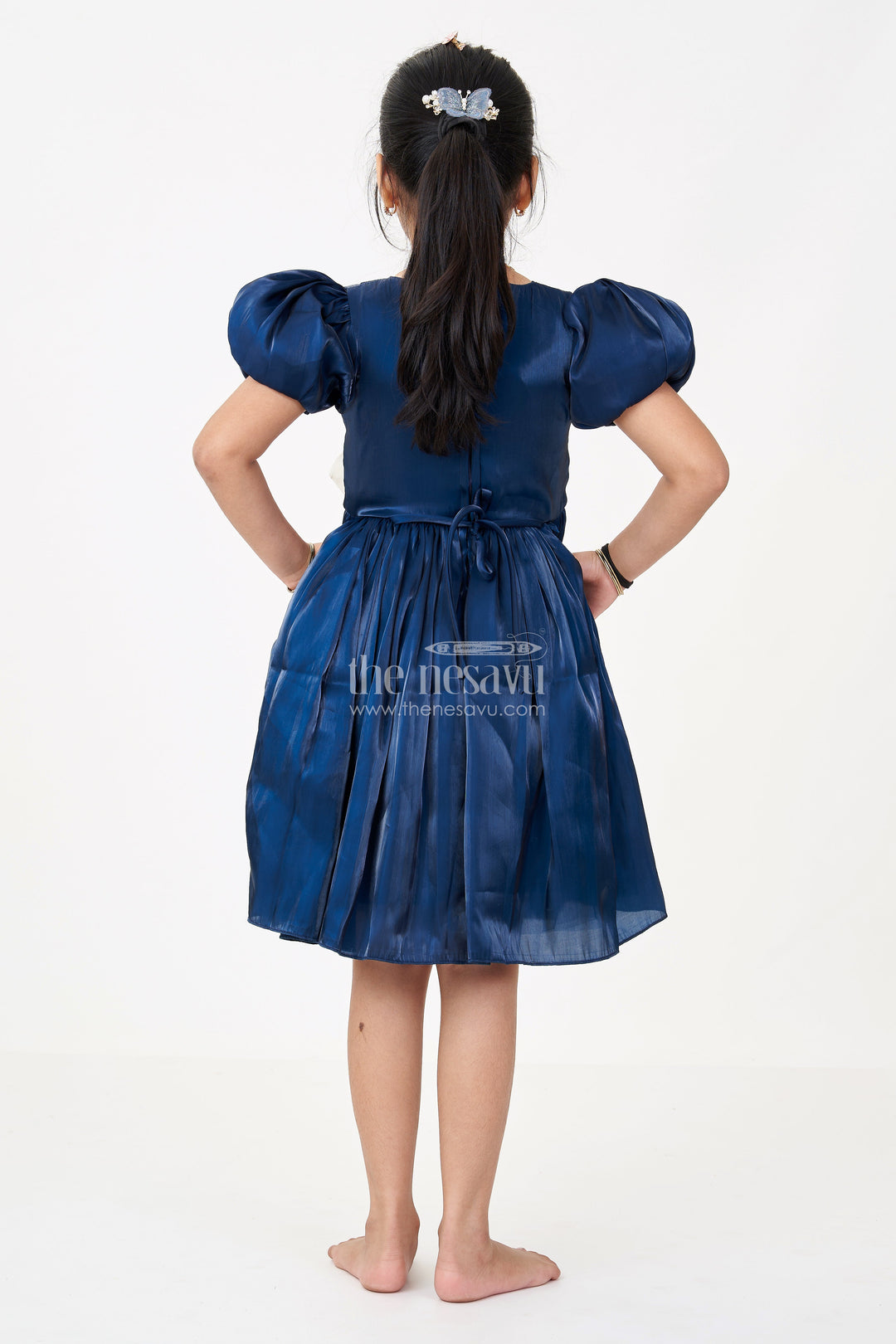The Nesavu Girls Fancy Frock Girls Disney Princess Frock in Navy Blue Satin with Puff Sleeves and Large Ivory Bow Embellishment Nesavu Girls Disney Princess Frock Satin Puff Sleeves Royal Bow Embellishment | The Nesavu